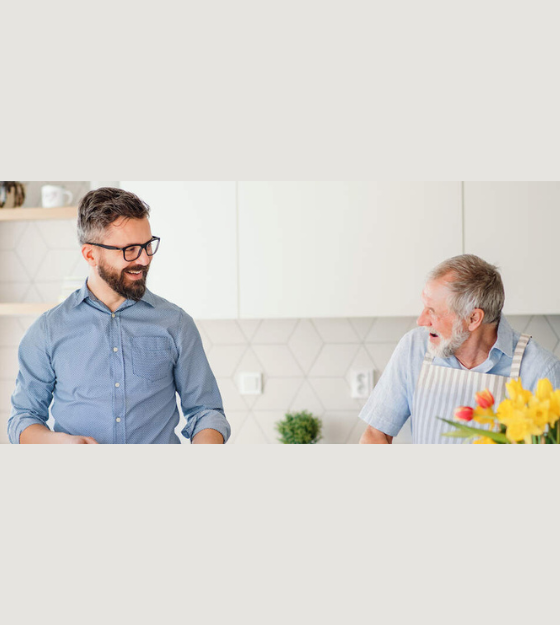 Clermont Park Senior Living Community in Denver, CO - son senior cooking