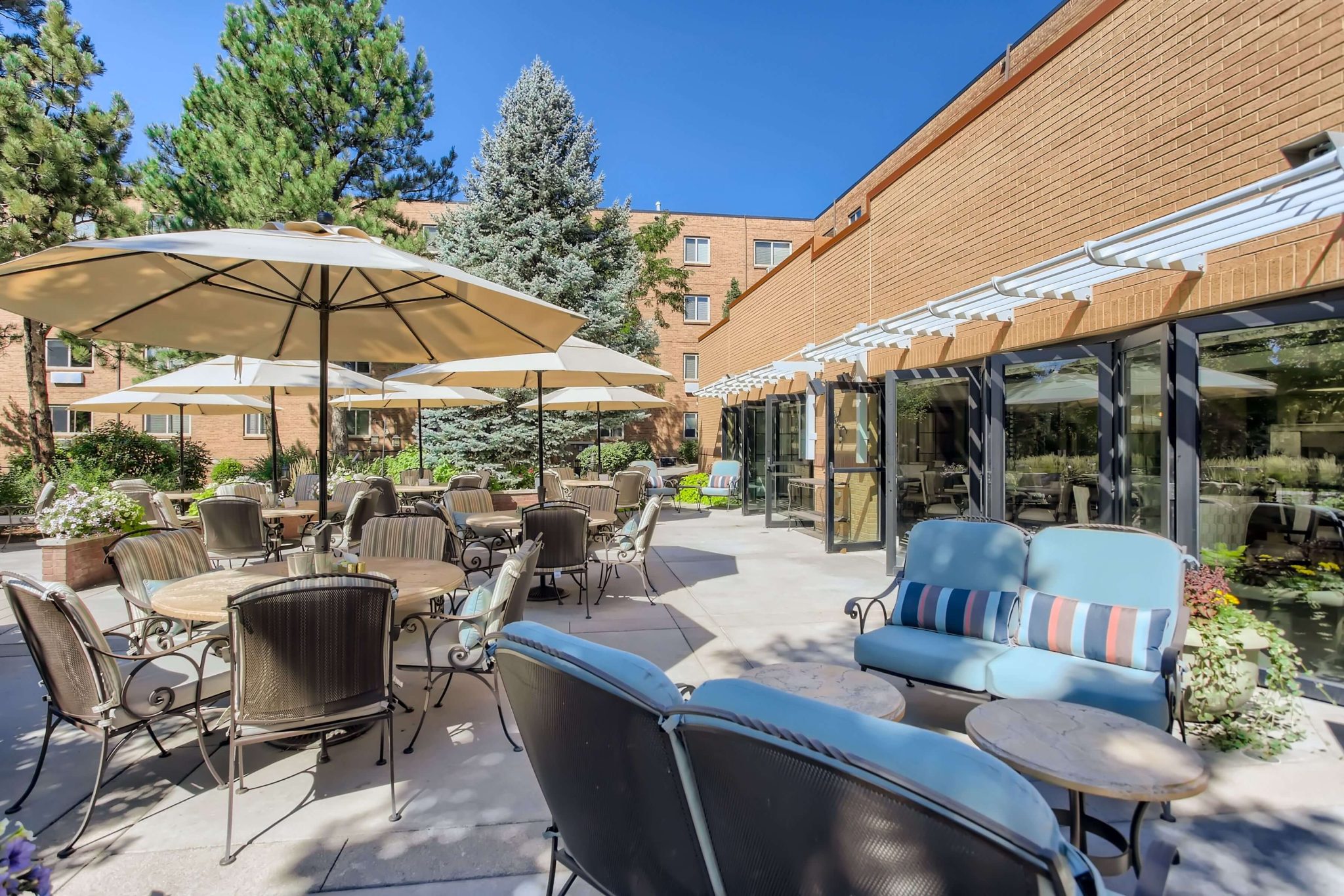 Clermont Park Senior Living Community in Denver, CO - pines cafe patio