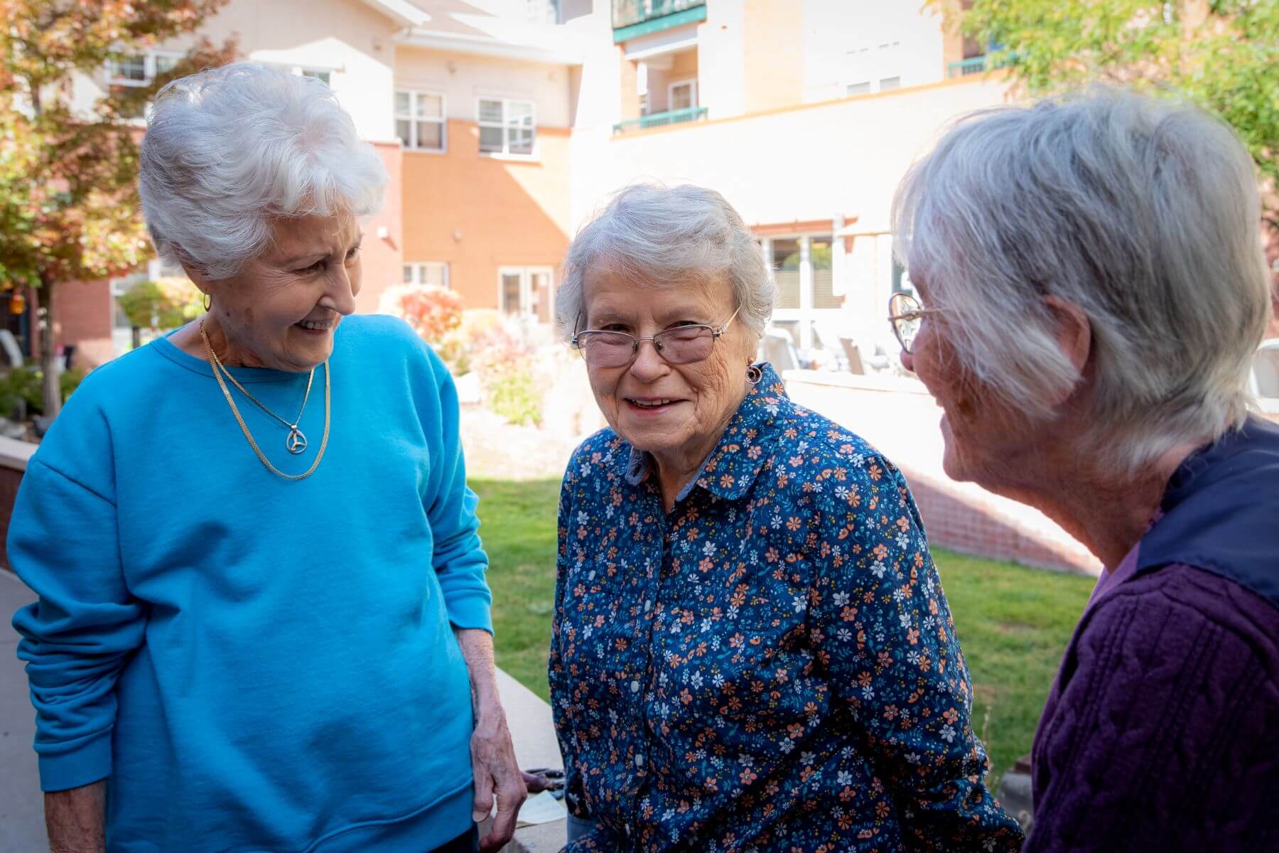 Clermont Park Senior Living Community in Denver, CO - three older women talk