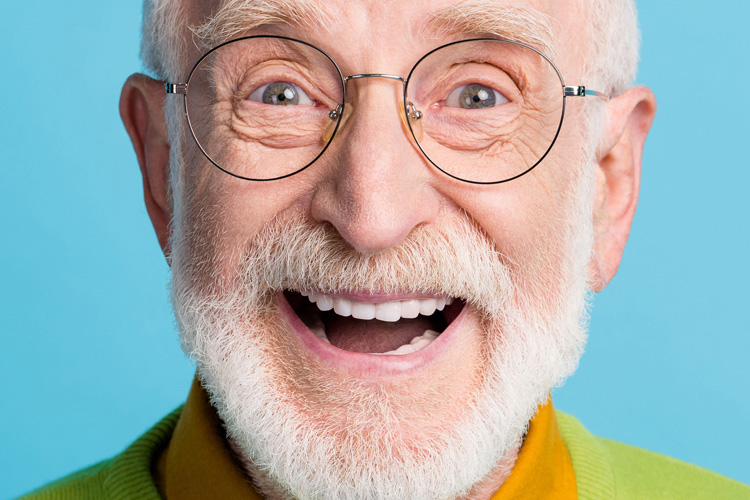 Clermont Park Senior Living Community in Denver, CO - clermont park senior man with open mouth talking