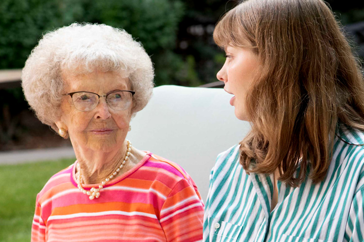 Clermont Park Senior Living Community in Denver, CO - clermont park senior woman with caregiver